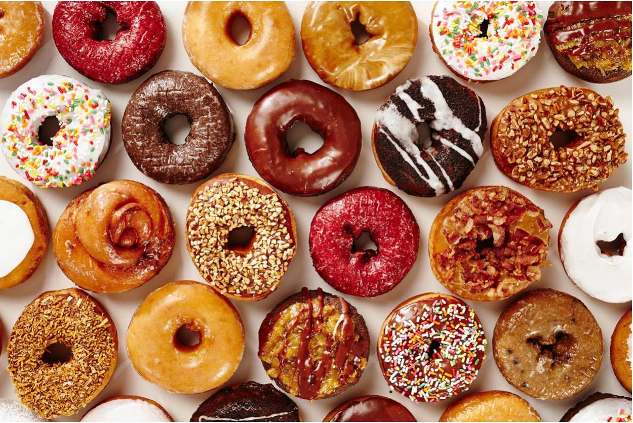 colorful spread of fresh donuts