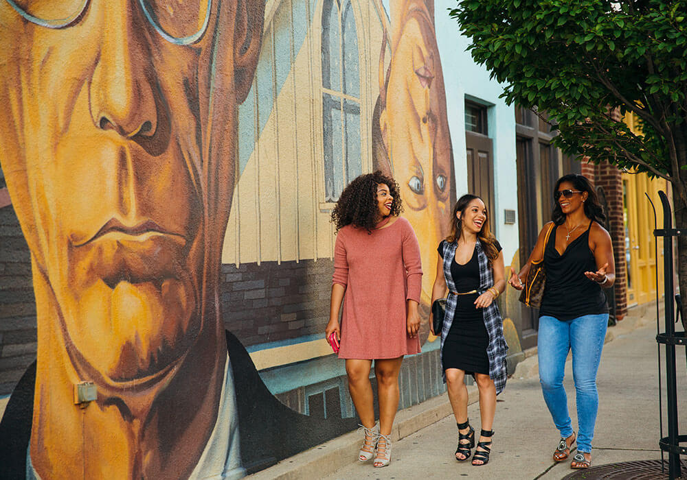 girls walking down street