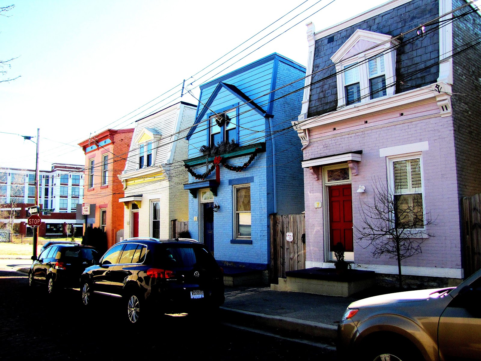 colored houses along a street