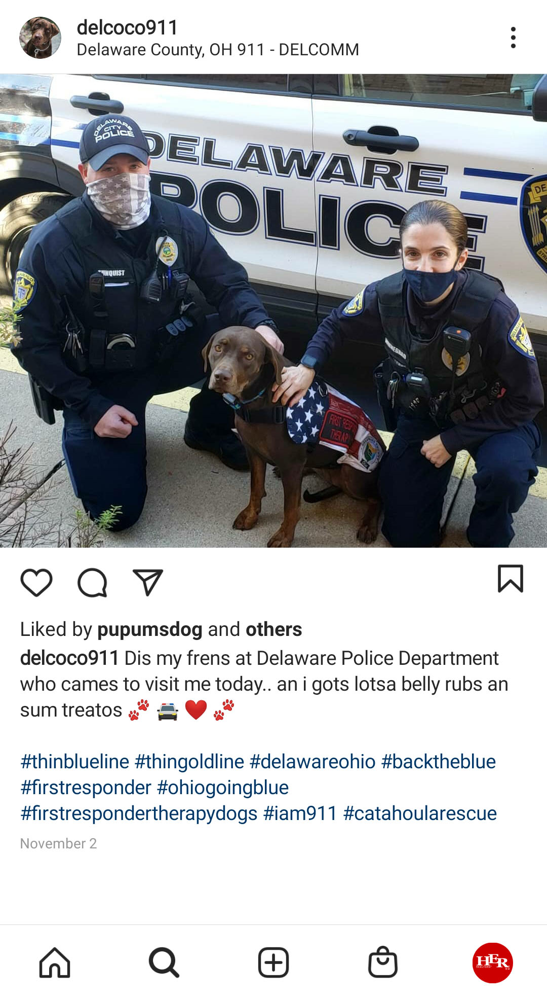 Two Officers with cop dog