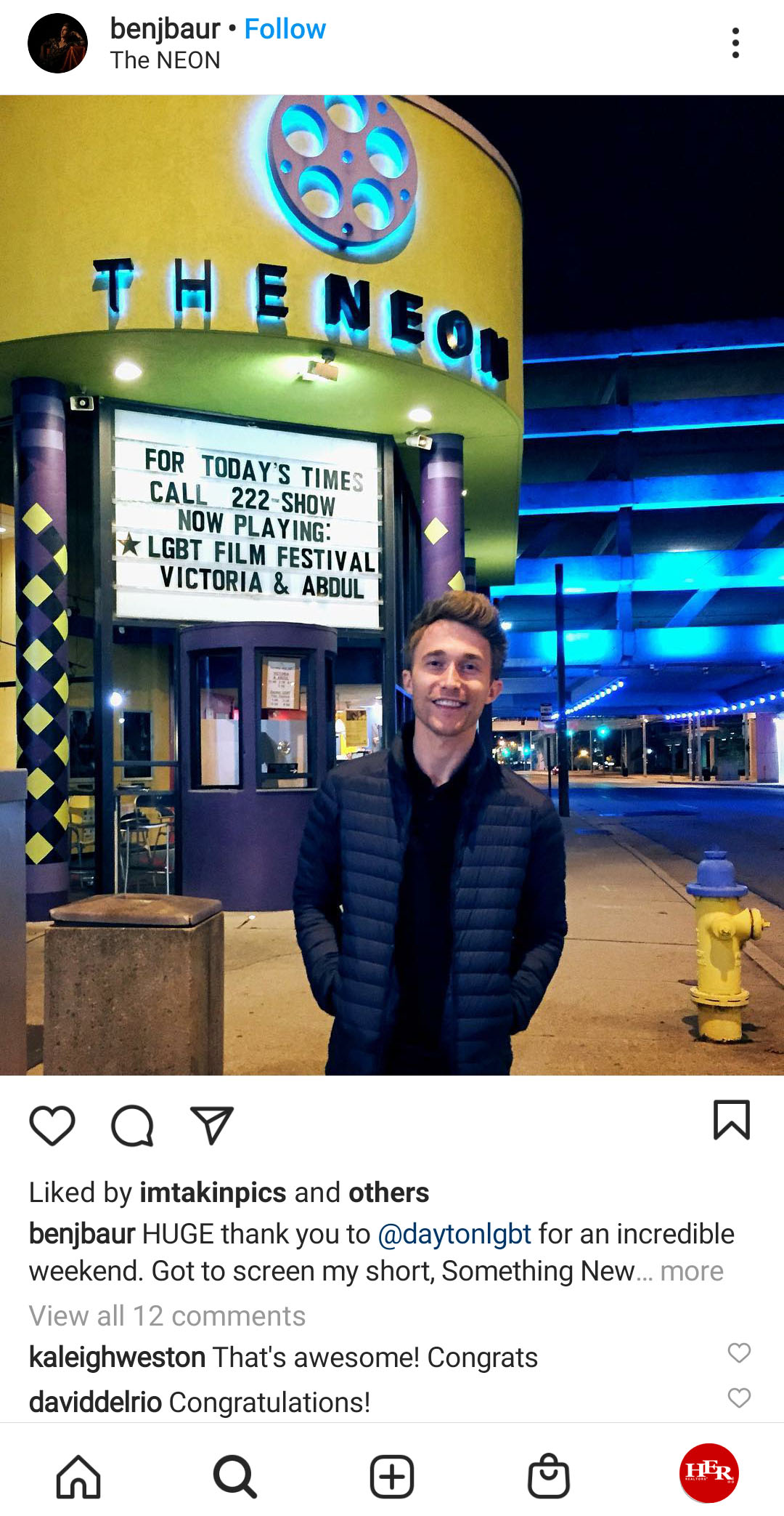 Man at front of the neon movie