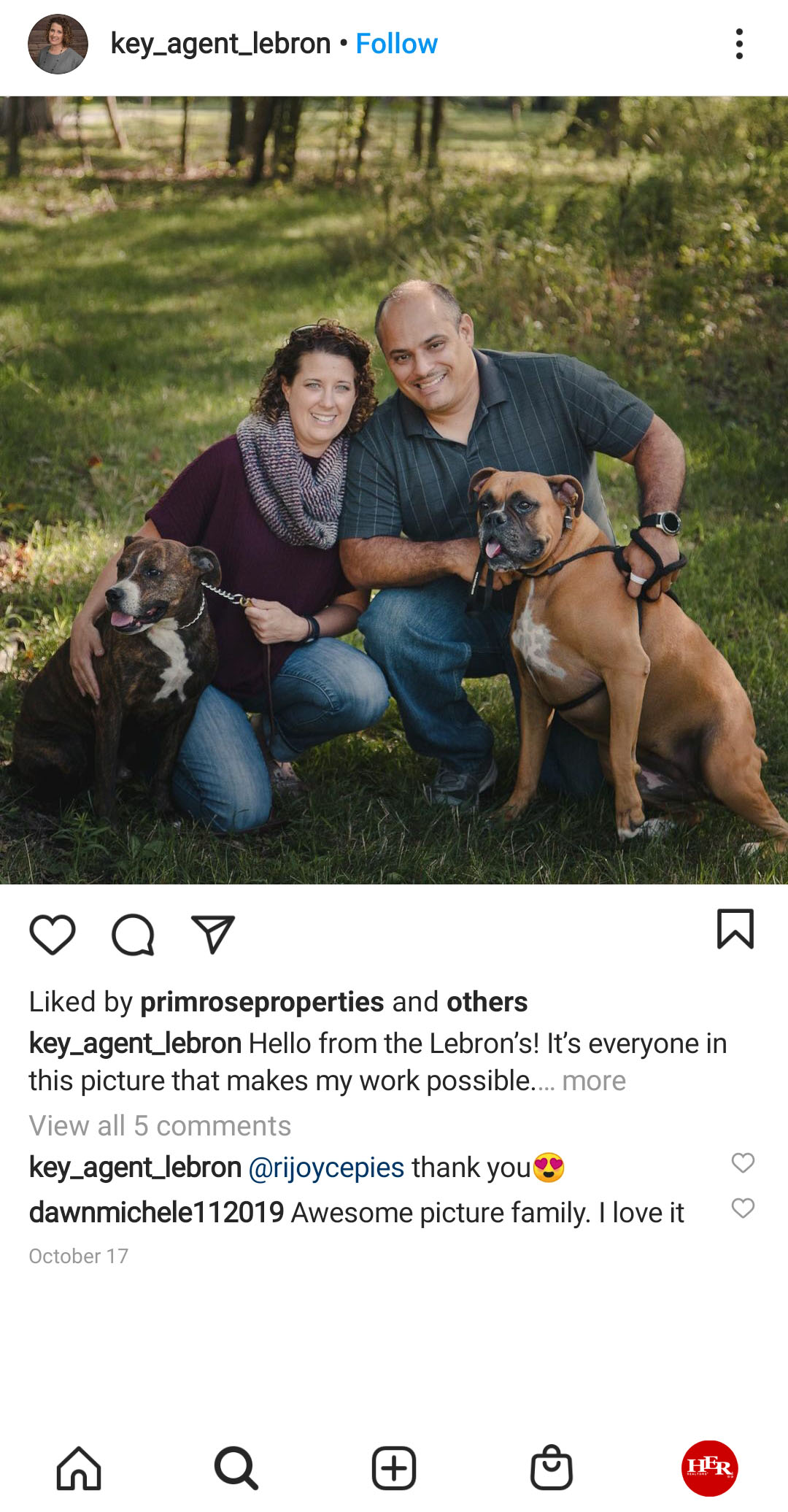 couple with the dogs