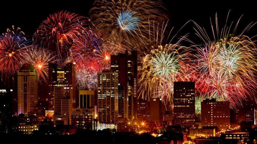 fireworks behind Columbus skyline at night