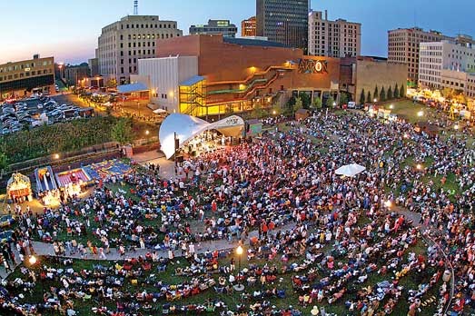 bird's eye view of a large crowd of people gathered at a festival