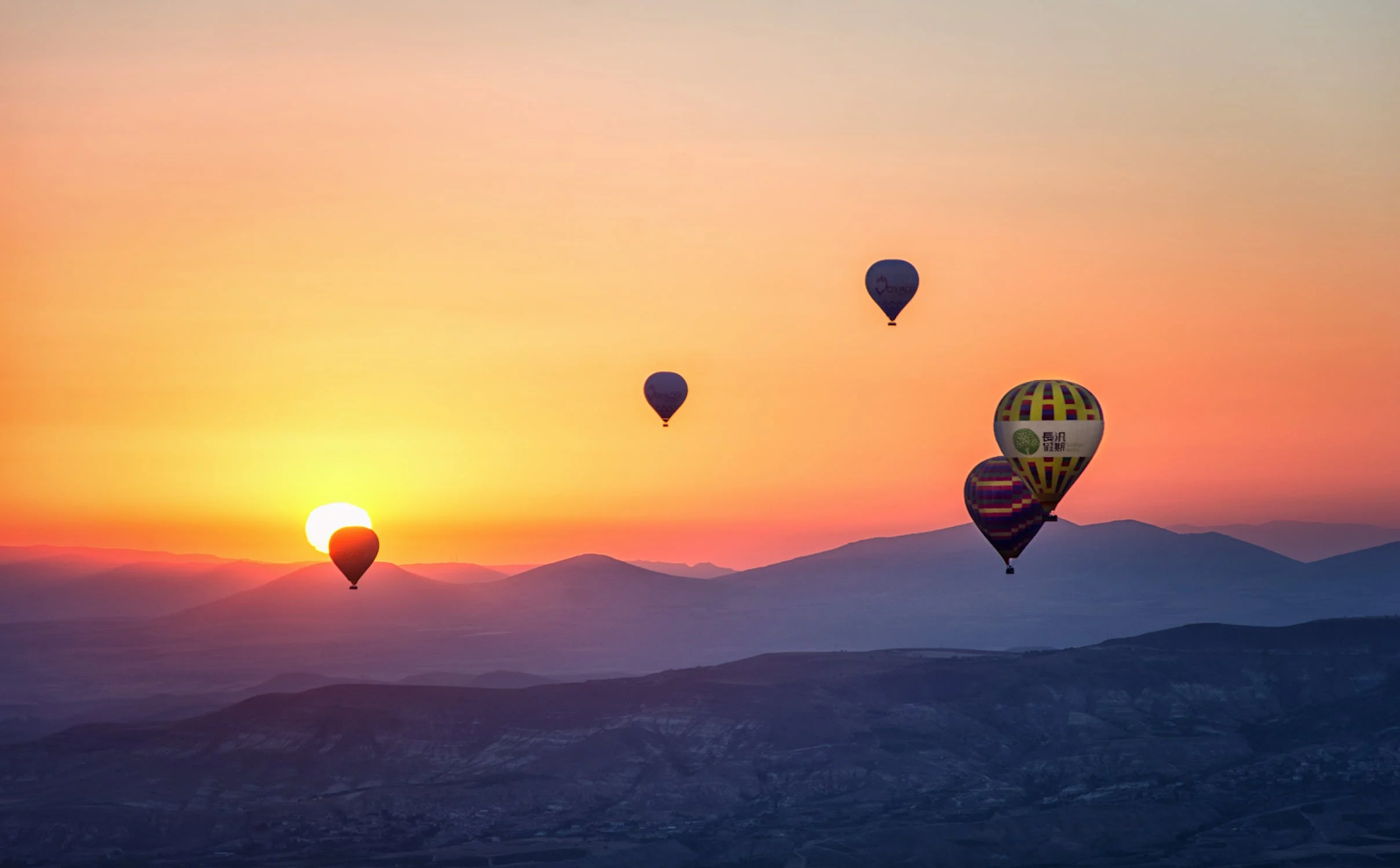 An image of hot air balloons for Gibboney's Aerostation.
