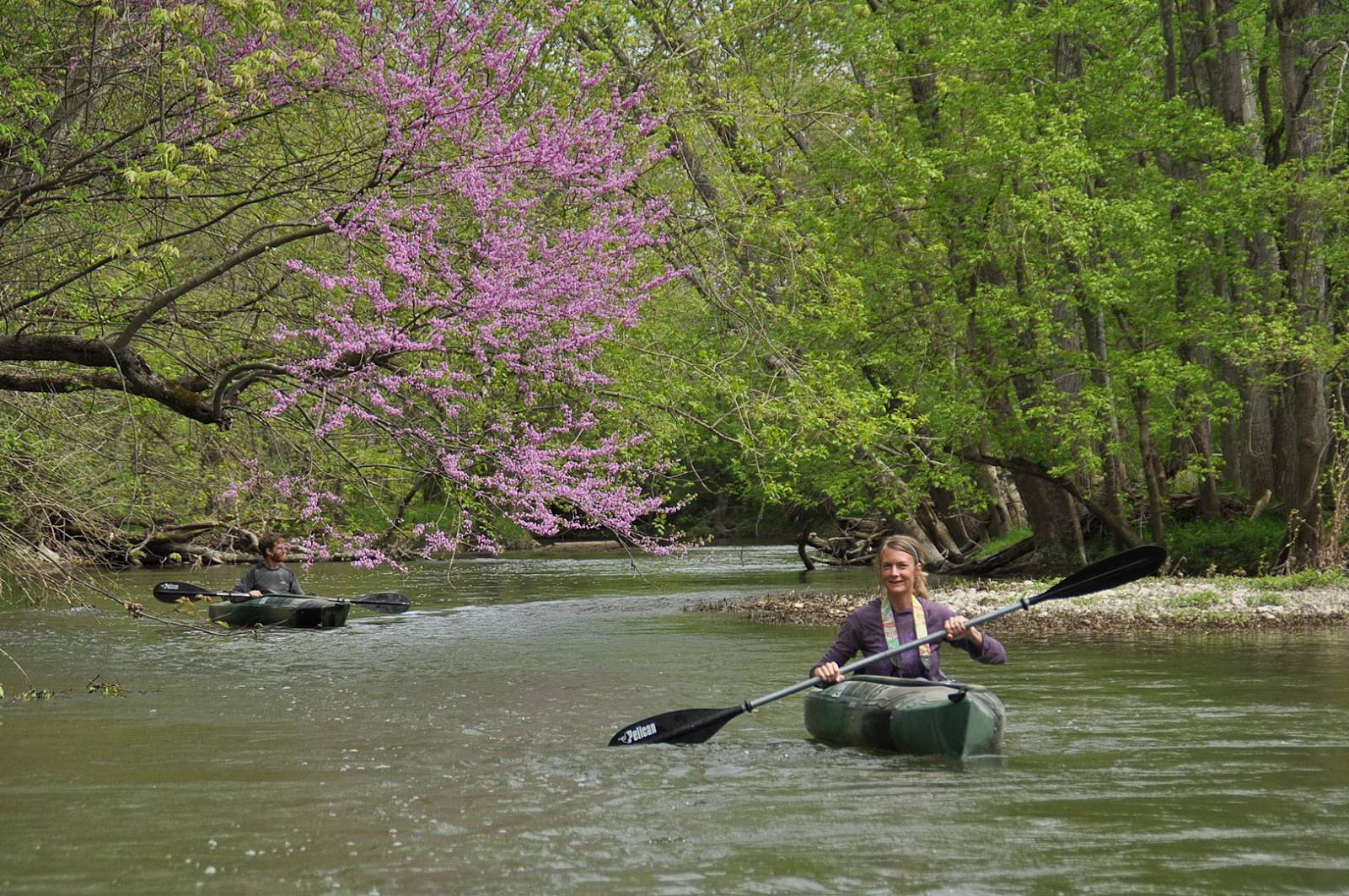 Couple is kayaking in a lake of Battelle Darby Creek park.
