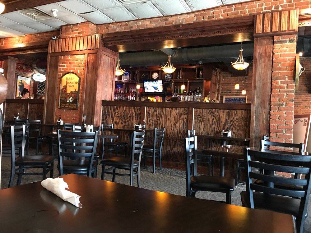 A picture of the rustic bar at the Old Bag of Nails Pub!
