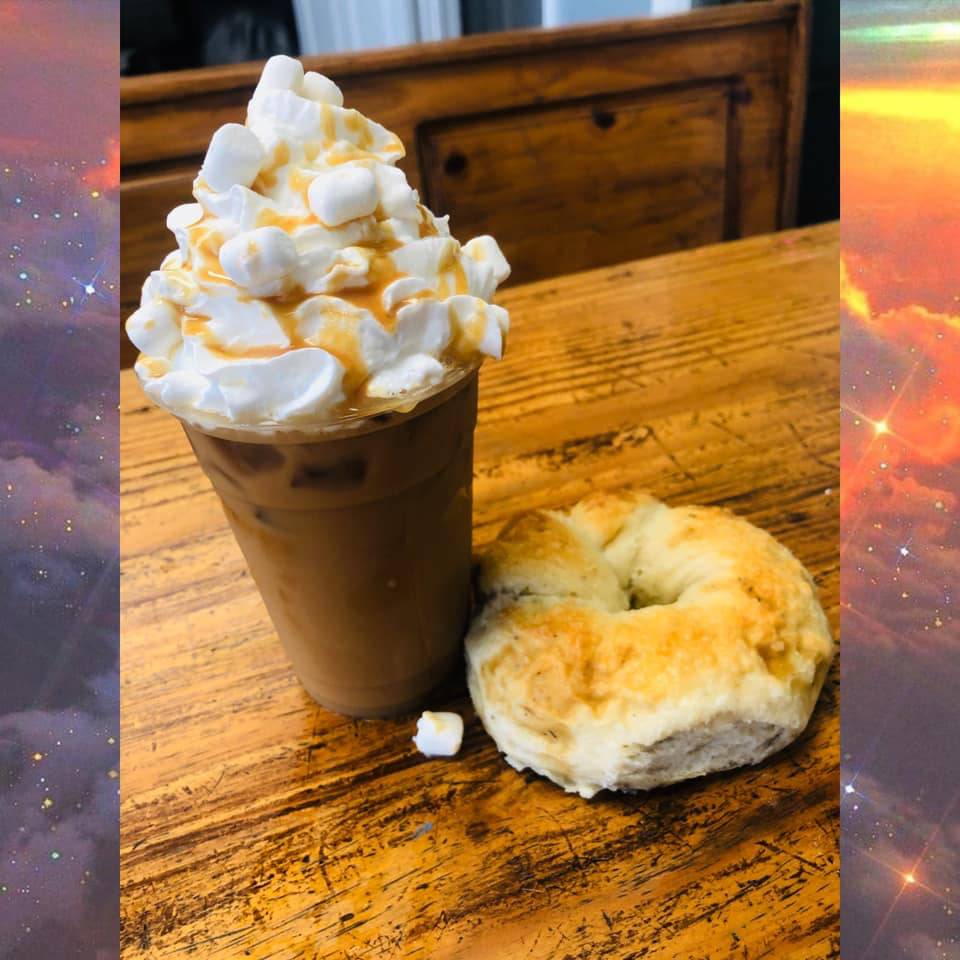 hazy morning latte with oat milk with garlic & herb bagel
