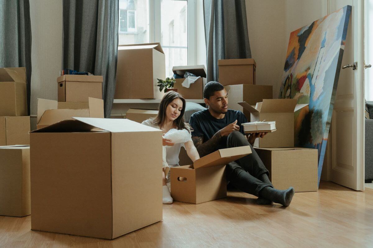 A couple starting to unpack