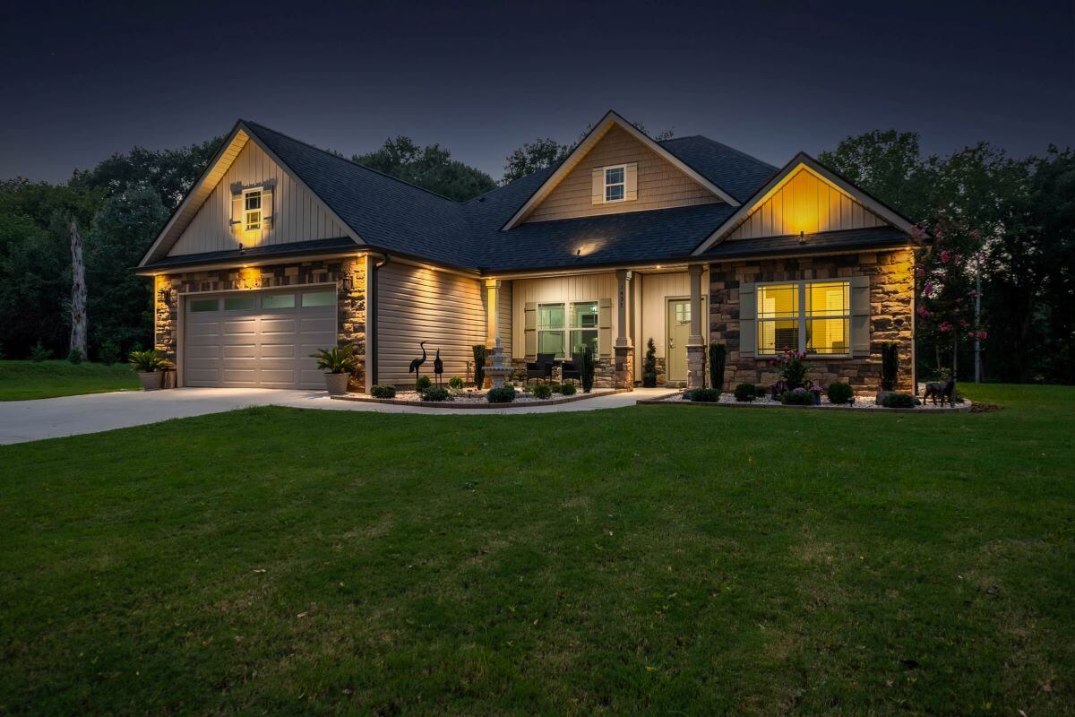 A well-lit home at night