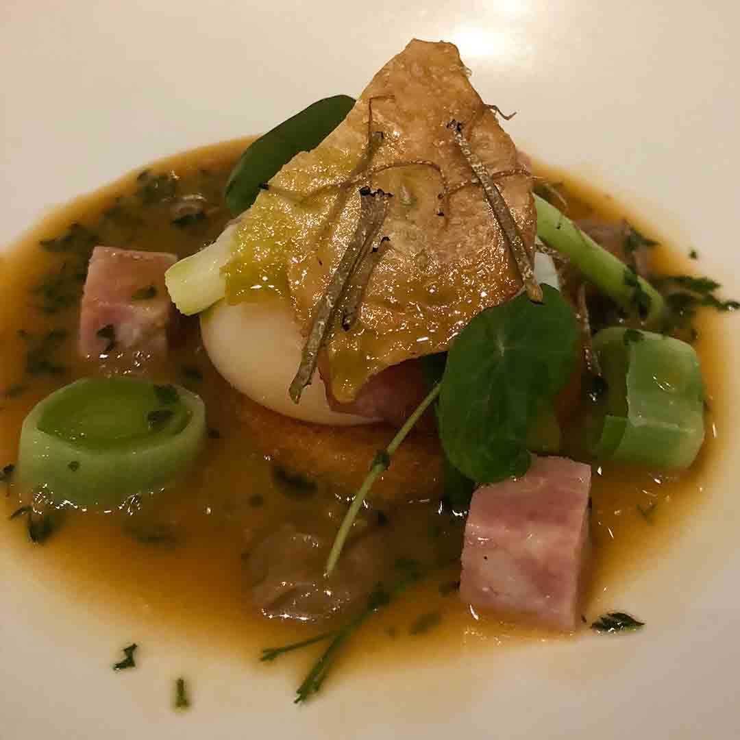 Royal Crescent tasting menu: Slow cooked duck egg with sausage and chicken crisp.