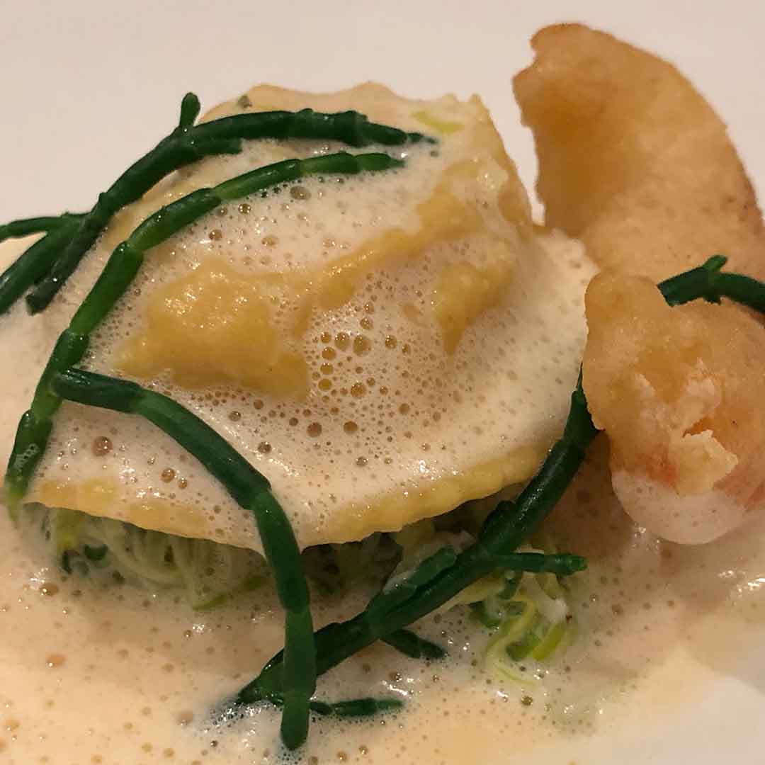 Lobster, Crab and Salmon Ravioli with Samphire and Tempura Prawn