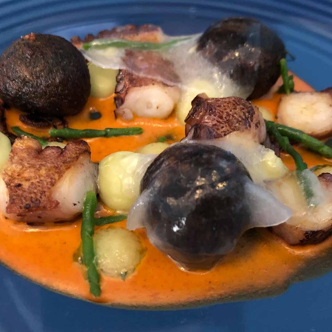 Octopus a la Plancha with Squid Ink Gnocchi