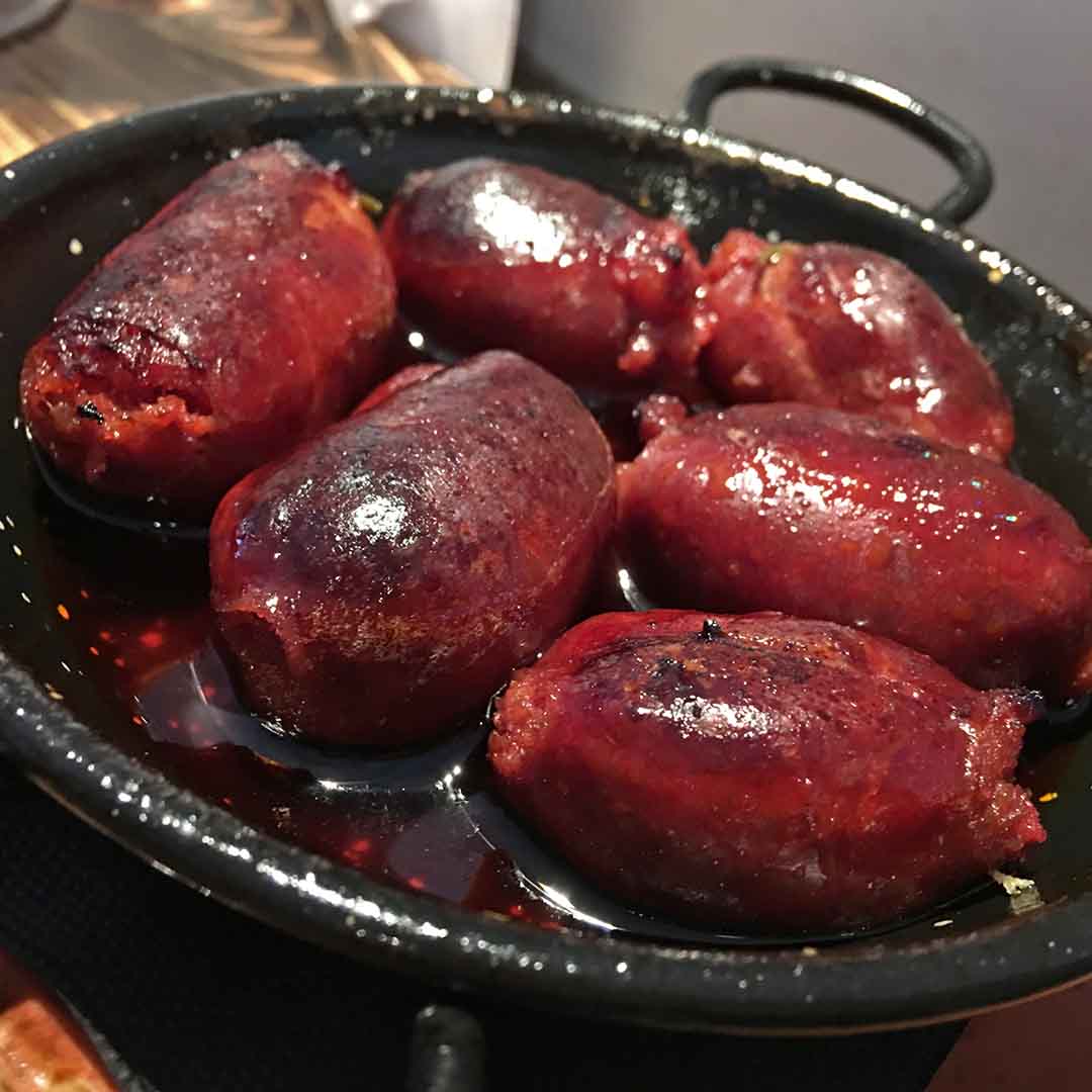 Fresh chorizo grilled in a red wine sauce