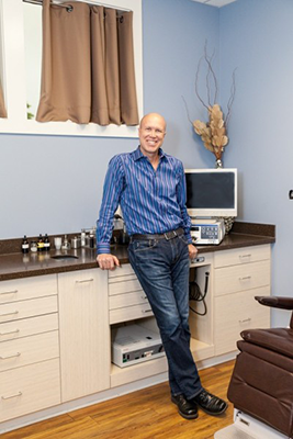 Dr. Ray Weiss in his office