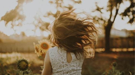 Young Girl with Sunflower