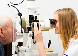 Elderly Man Checking for Glaucoma Problems at Dallas Eye & Ear