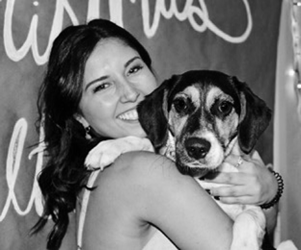 Brooke Starnes Hugging a Puppy