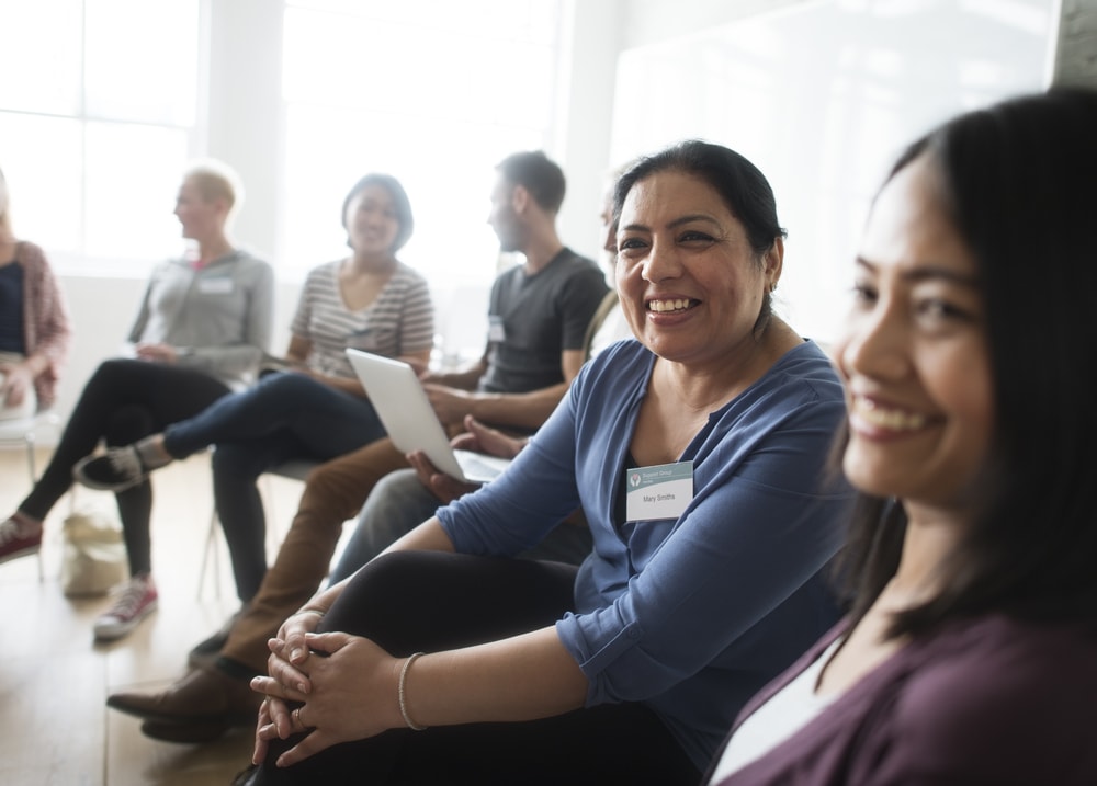 Support group with women smiling