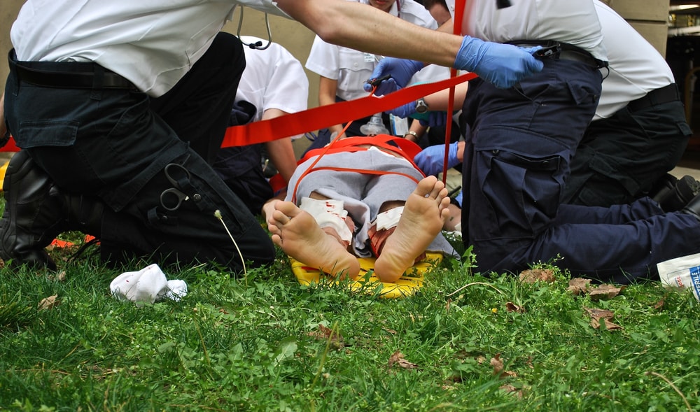 EMTs on scene caring for an overdose victim