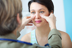 Woman getting consultation for in-office balloon sinuplasty