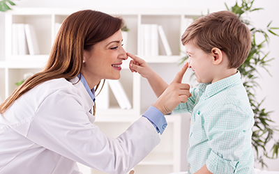 Doctor and pediatric patient in St. Paul, MN