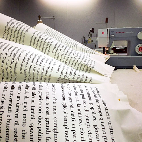 Wallpaper book pages sewn together.