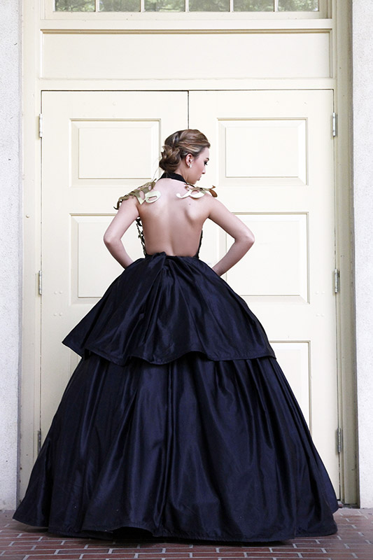 Back of model with metal top and hoop skirt bottom.