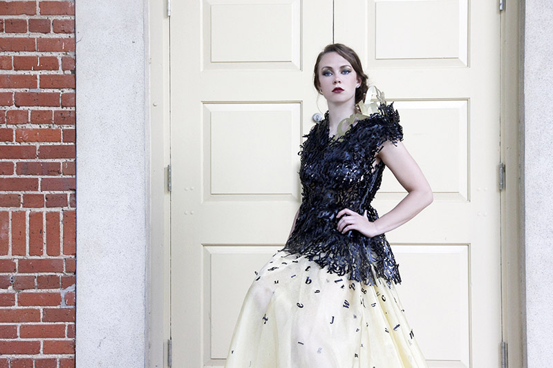 Leather typography top and long gold skirt.