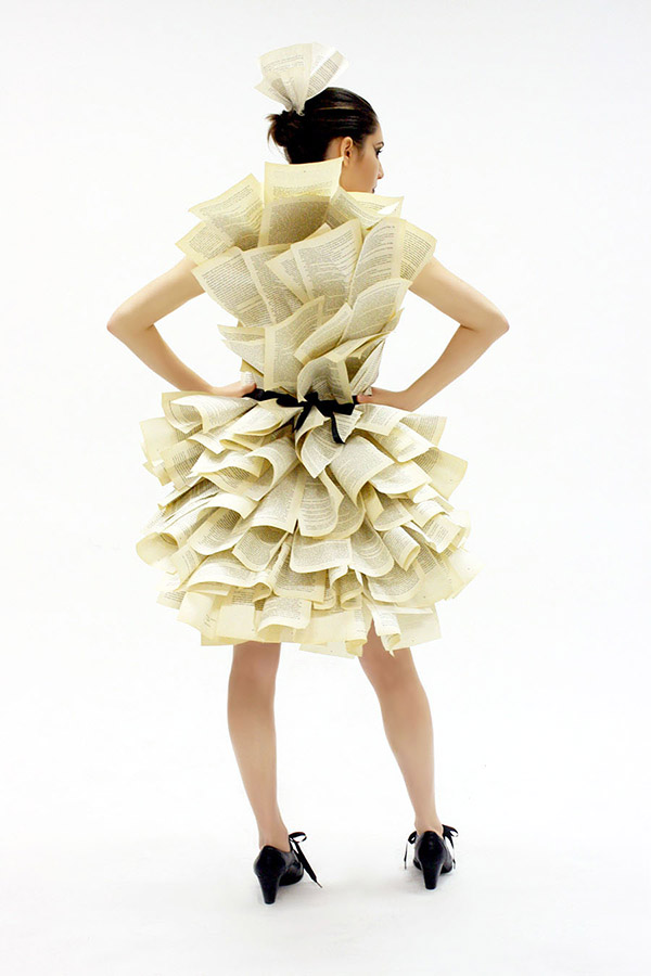Model showing back of paper dress.