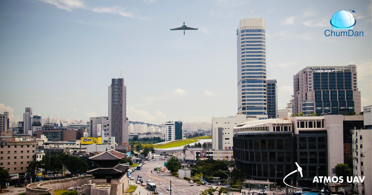 Illustration of the Marlyn VTOL Fixed-Wing Drone flying over Seoul (Korea)