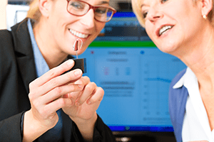 Patient receiving hearing aid consultation