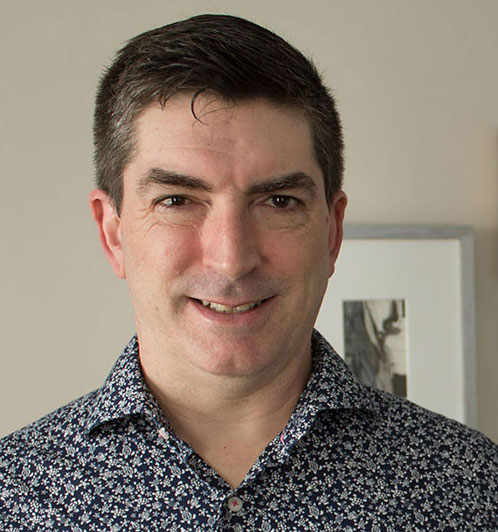 headshot of Michael Collins