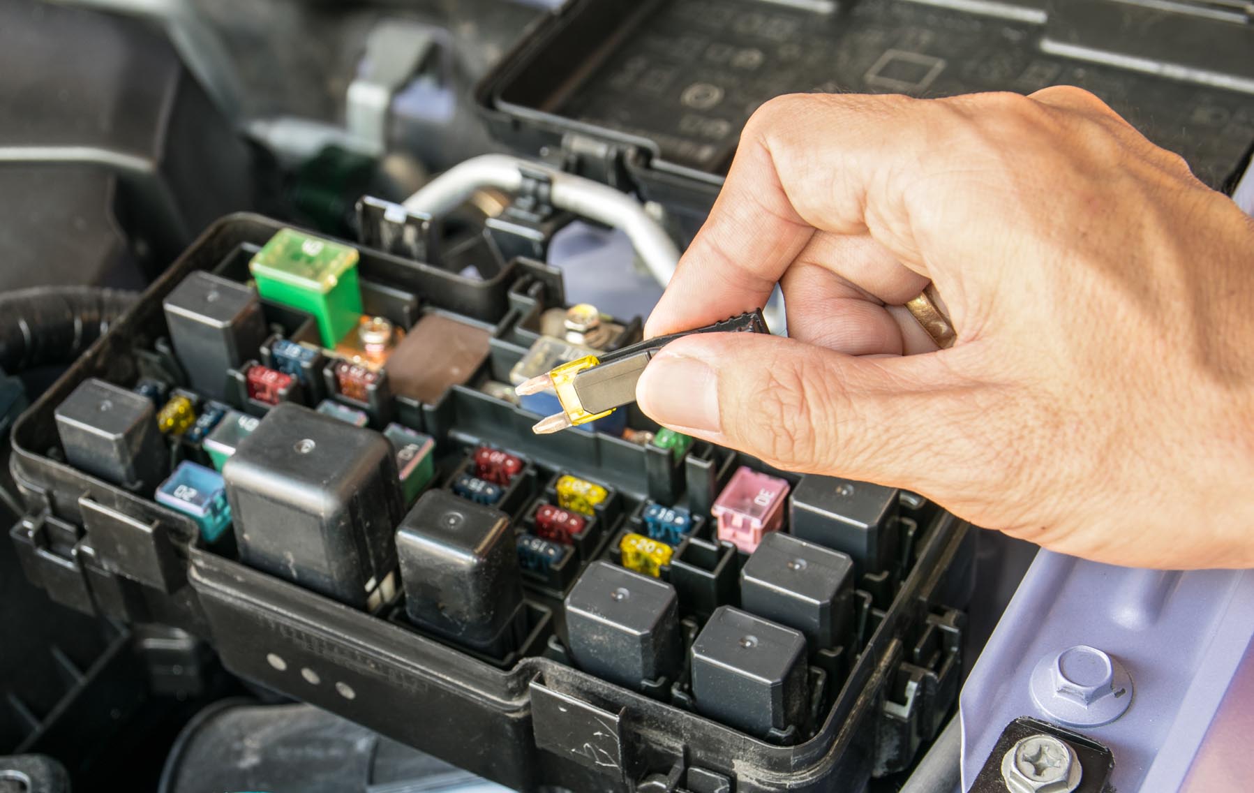 How do I replace a burned out fuse?