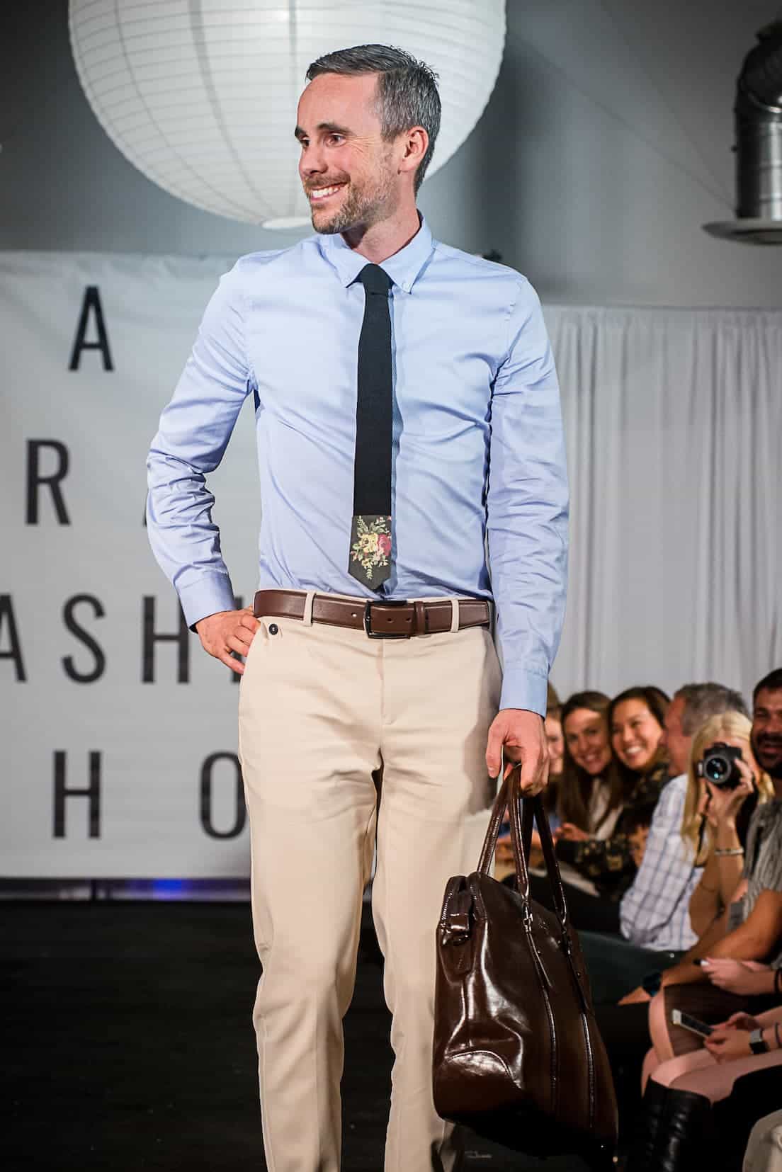 man modeling charles vane clothing in fashion show