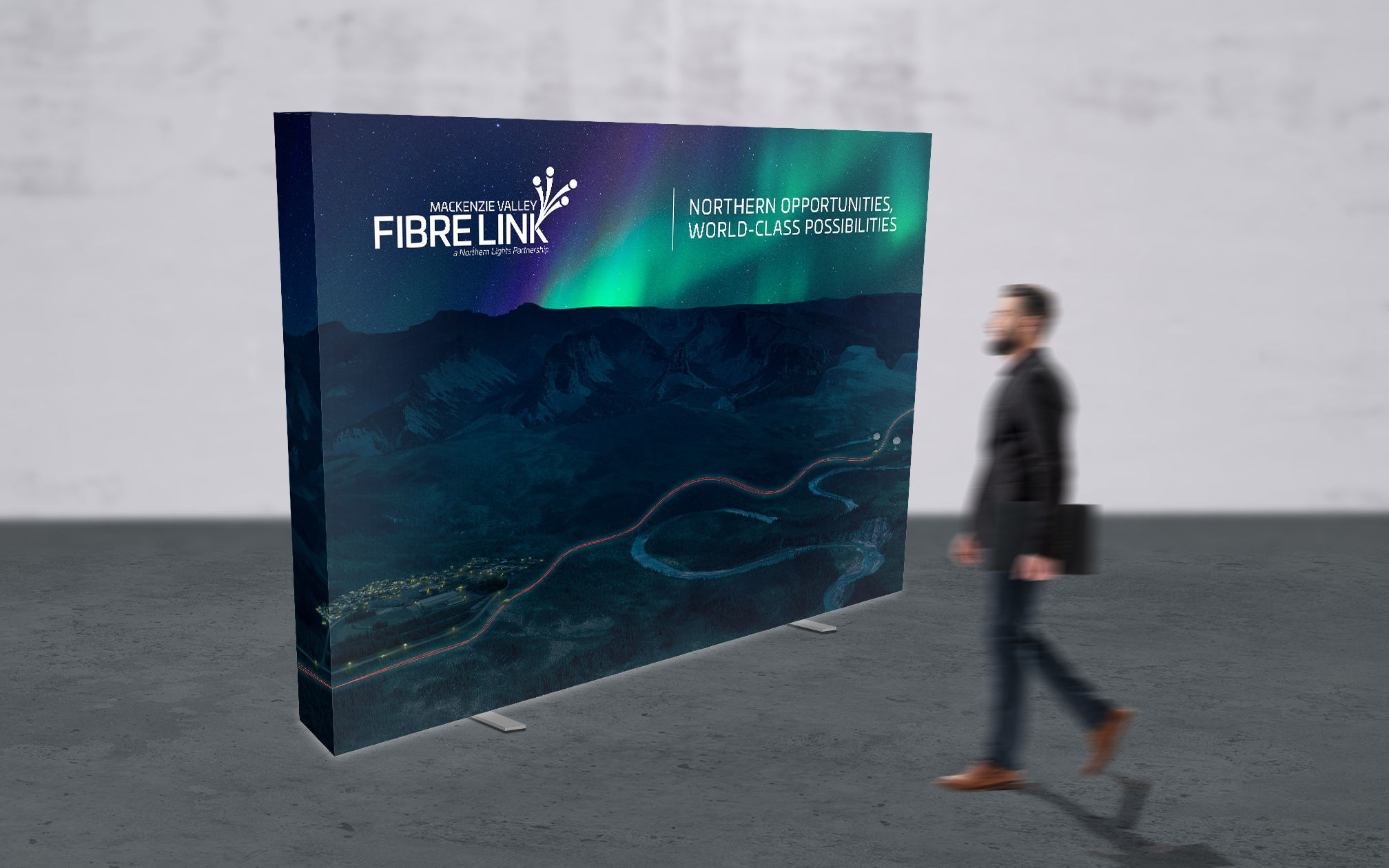 Photo of a backlit trade show booth.