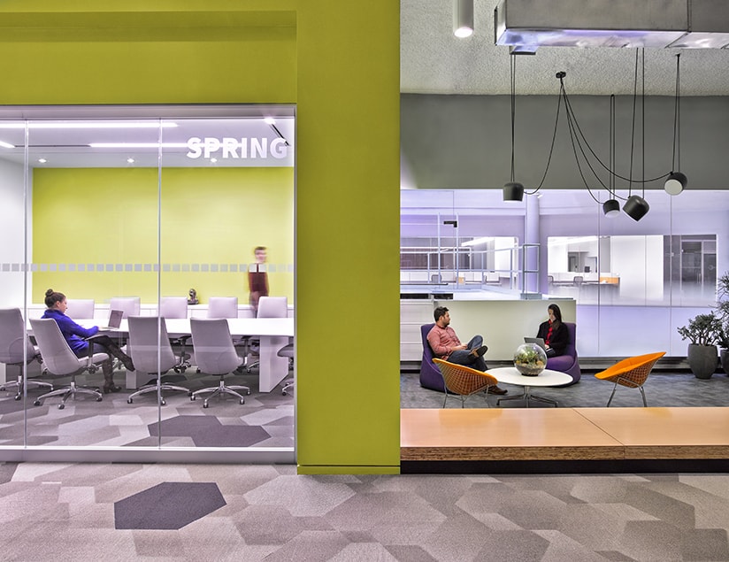 The offices for Rocket Fuel in Manhattan posed an interesting challenge as the artificial intelligence marketing company was growing so quickly, the location and size of the project changed several times during the design process. The resulting design is a dynamic juxtaposition of elements from the SF Headquarters to remain on brand while incorporating new materials and forms to celebrates the unique New York location. A bright color palette was utilized to accentuate the unique departments and sub- group within the space.