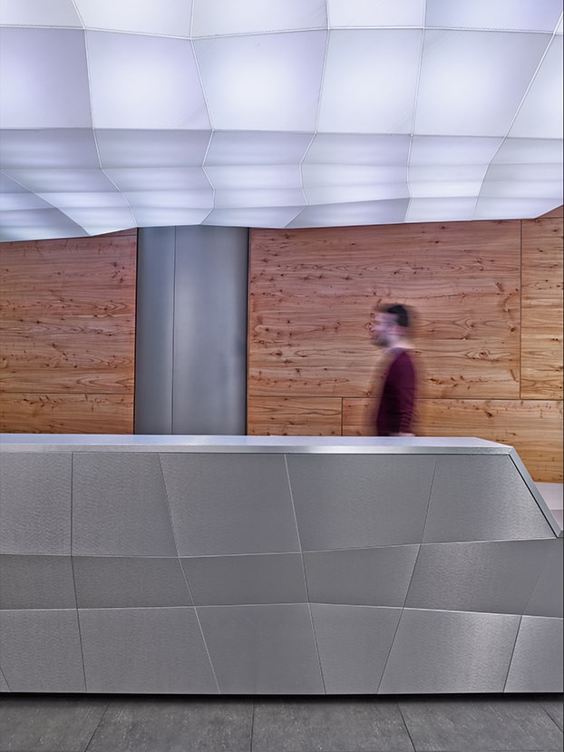 The offices for Rocket Fuel in Manhattan posed an interesting challenge as the artificial intelligence marketing company was growing so quickly, the location and size of the project changed several times during the design process. The resulting design is a dynamic juxtaposition of elements from the SF Headquarters to remain on brand while incorporating new materials and forms to celebrates the unique New York location. A bright color palette was utilized to accentuate the unique departments and sub- group within the space.