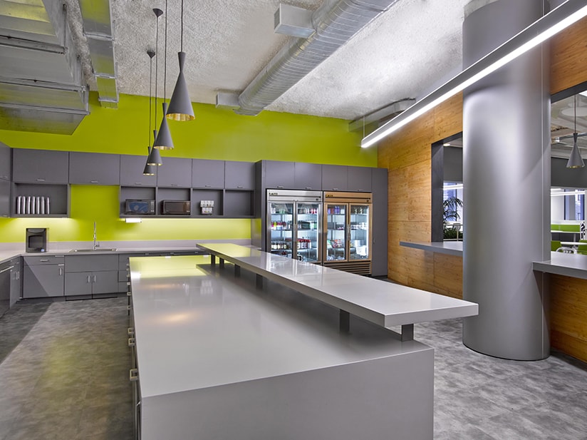 The offices for Rocket Fuel in Manhattan posed an interesting challenge as the artificial intelligence marketing company was growing so quickly, the location and size of the project changed several times during the design process. The resulting design is a dynamic juxtaposition of elements from the SF Headquarters to remain on brand while incorporating new materials and forms to celebrates the unique New York location. A bright color palette was utilized to accentuate the unique departments and sub- group within the space.
