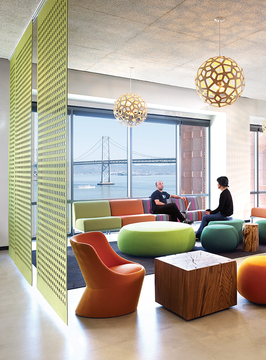 QA was commissioned to design the new corporate headquarters for New Relic, the fast-growing industry leader in Data Analytics for App Monitoring. Custom pen Collaborative Areas are located in the floor’s corners for quick informal meetings and impromptu mini-workstations for staff visiting other departments. The most dynamic space within the four full floors of offices is the large Café and All Hands Area that accommodates informal meetings, all-office presentations, and interactive interoffice social functions. The palette for New Relic was derived from the image invoked by its name- the juxtaposition of old and new, modern and decayed. Using reclaimed old growth elm, the wood is mingled amongst flamed steel walls, perforated metal panels and colorful furniture to create a warm, lively, and inviting work place. We are honored and excited that our design for the New Relic Headquarters was selected by the SF Business Times as one of the top "10 Coolest Offices in the Bay Area 2018."