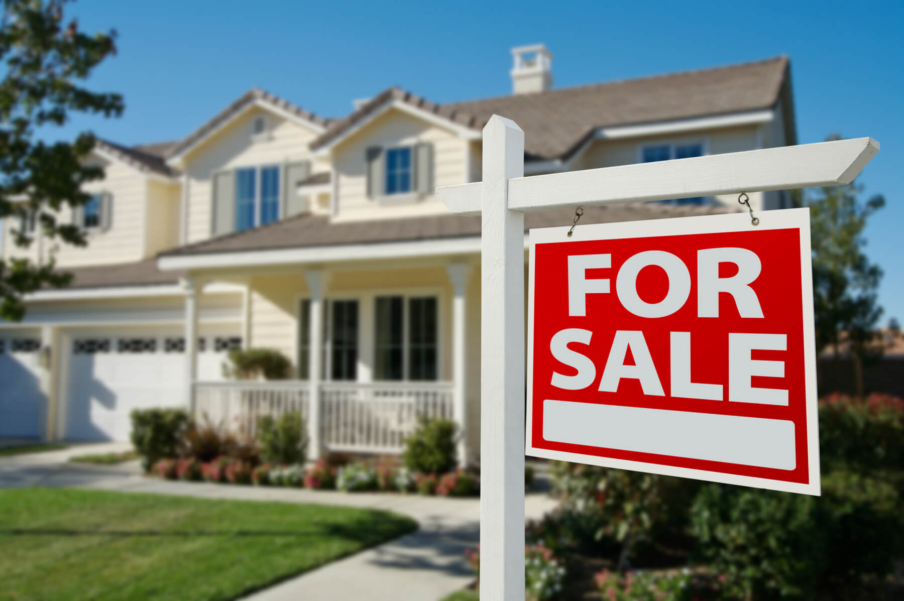 House for sale with sign
