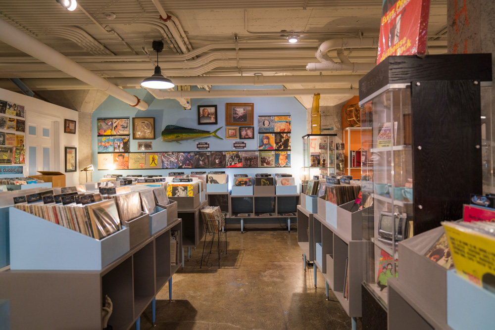 The inside of record and vinyl shop Kicksville Vinyl & Vintage on R Street in Sacramento for Visit Sacramento.