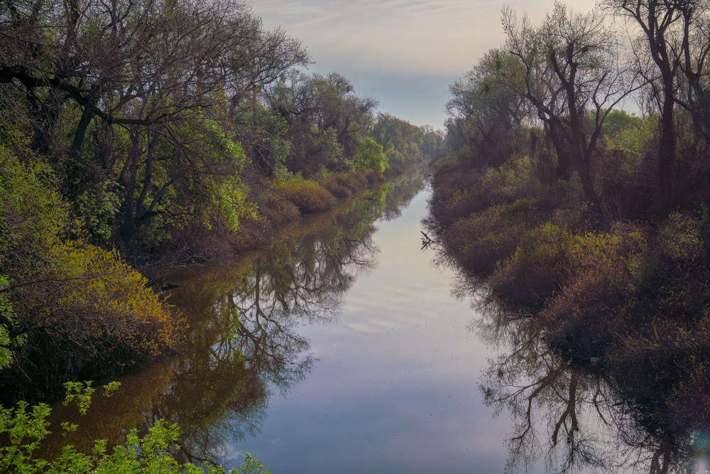 The American River, where you can bike across a bridge and along trails in Sacramento, for Visit Sacramento.