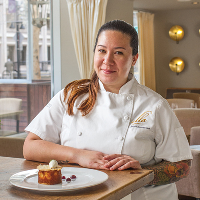 Chef Jane Anderson sits behind a pastry at Sacramento's Farm to Fork restaurant Ella in Downtown for Visit Sacramento.