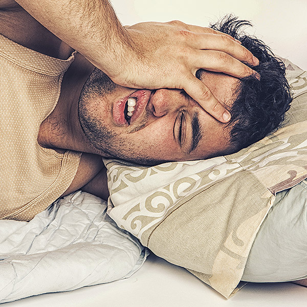 Photo of Man appearing to not sleep well