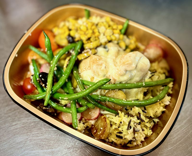 Lodge Garden Vegetable Strudel with farmer-delivered beans, jalapeño corn, and a wild rice blend.