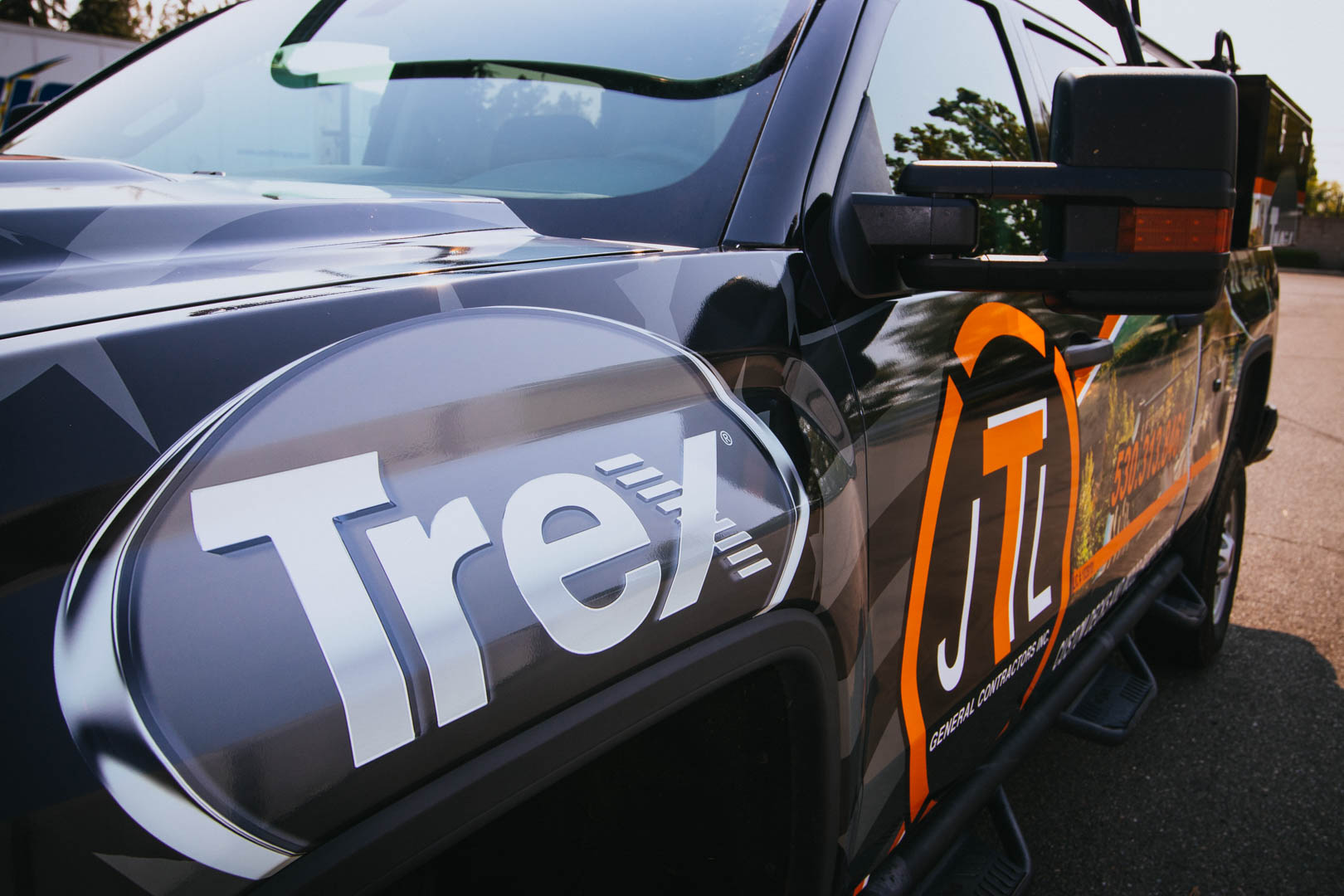 Trex custom GMC Wrap Vehicle Wraps Palmer Signs Inc.