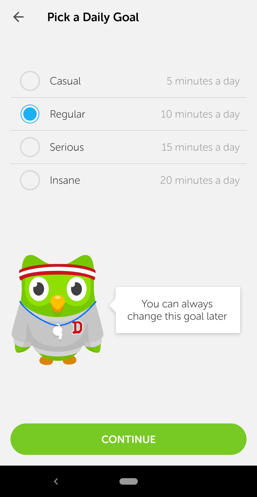 This is a screenshot of Duolingo's onboarding process in which users are asked to set a goal. Goal setting is a powerful motivator in user onboarding. There is an owl in a sweatshirt and gym gear and the title says "pick a daily goal".