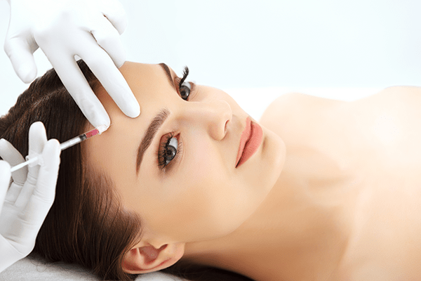 Woman receiving Botox treatments
