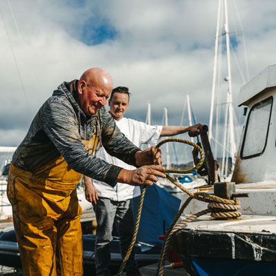 Head Chef Michael Leathley with langoustine fisherman Hughie Macleod